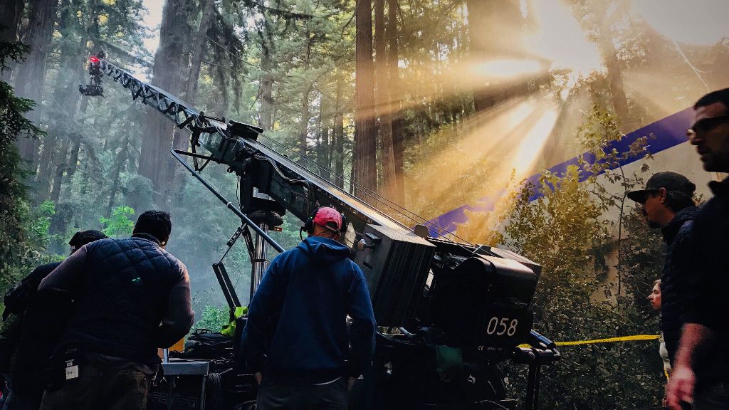 camera-crane-shooting-a-movie-in-the-forest-2022-11-02-16-06-31-utc